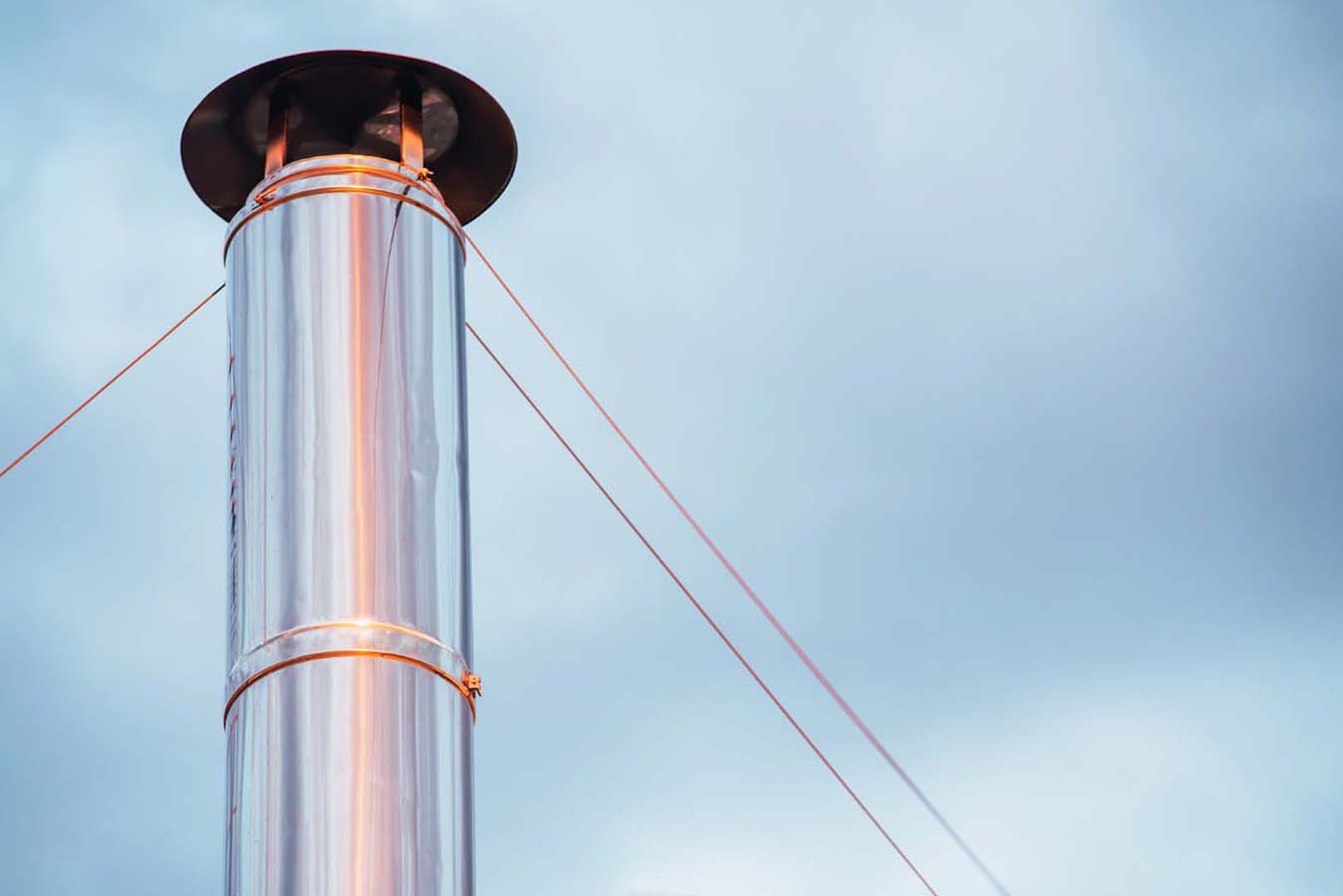 exterior metal chimney pipe on top of a roof 2024 10 18 17 40 08 utc 1 Pizza Oven Ireland woodfire pizza supply and fit
