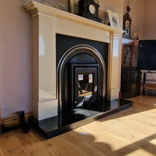 a fireplace with a clock on top