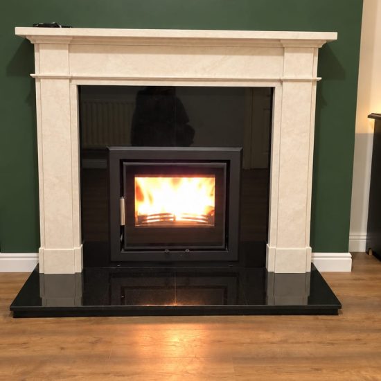 eco c550 cassette insert stove in a new marble fireplace surround